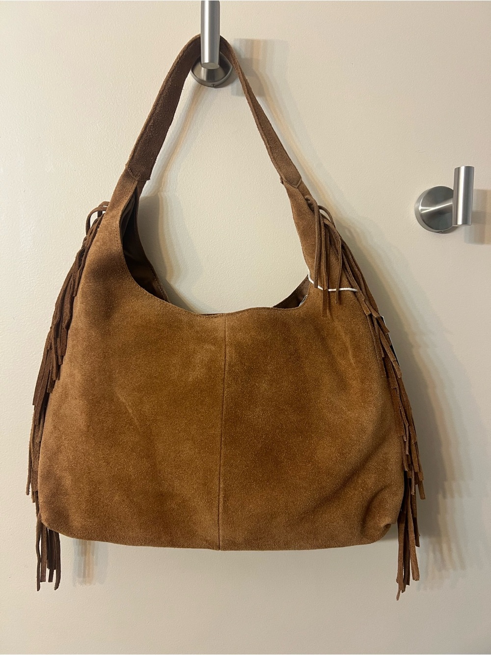 Haute Hippie brown suede hobo bag featuring long fringe detailing on the sides. - Picture 2 of 5
